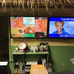 a large tv screen with a picture of a woman on it