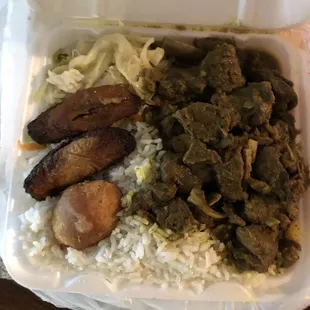 Curry goat, plantain, fries dumpling and white rice