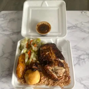 Jerk Chicken with cabbage, rice and peas, plantains, also with bread, jerk sauce