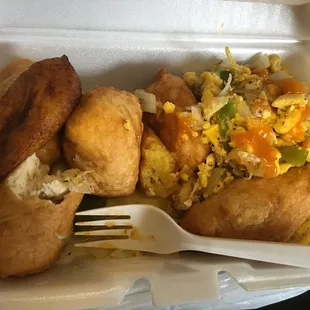 Salt fish with ackee and fried dumplings / fried sweet plantains
