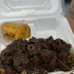Small oxtail, rice and peas, plantain