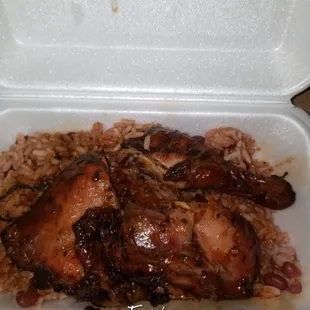 Jerk chicken with rice and peas