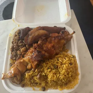 Bbq Chicken, rice and peas, beans, and plantains