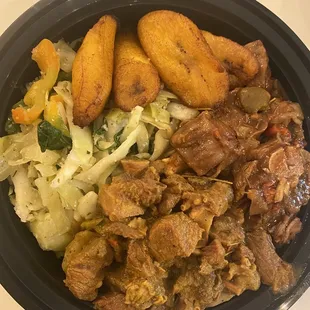 Combo of oxtails and goat curry