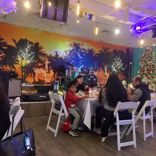a group of people sitting at a table