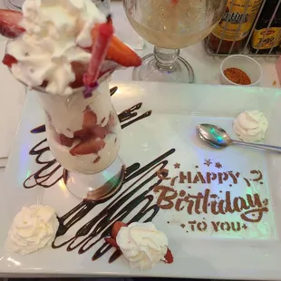 Bday dessert, strawberries and whipped cream
