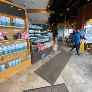 a man walking past a store