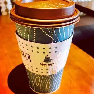 a cup of coffee on a table