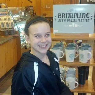 a young girl in a coffee shop