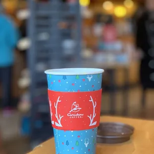 a cup of coffee on a table