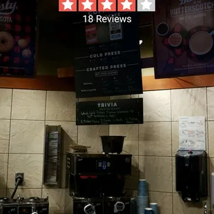 a coffee machine and coffee cups
