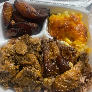 Beans and Rice, Mac and cheese, Plantains  Jerk Chicken and Oxtails