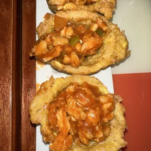 three plates of food on a table