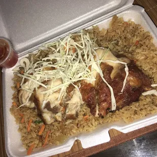 Fried chicken over fried rice