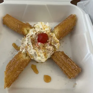Churros and delicious whipped cream.