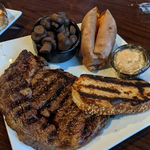 Fatty steak, boiled mushrooms, sweet potato and wierd grilled bread