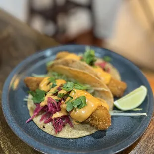 2 Pescado Tacos (~$15)