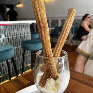 Hmmmmm fresh house made churros. Chill vibes and good drinks.