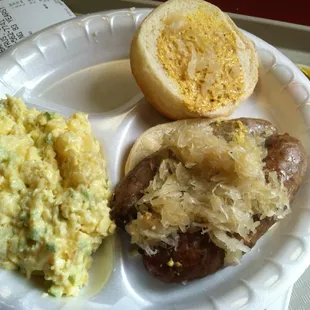 Bratwurst with sauerkraut and potato salad.