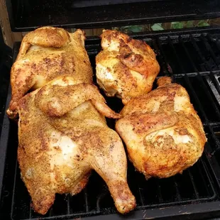 chicken cooking on a grill