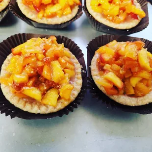 Peach tartlets: fresh peaches, baked in a sugar - cinnamon glaze
