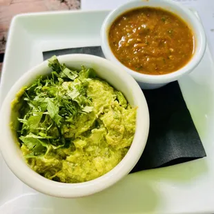 Free chips and salsa for happy hour (paid for the guacamole). Salsa is not spicy at all and guacamole was decent