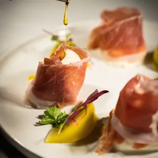 Burratta with Prosciutto San Daniele with Heirloom tomatoes