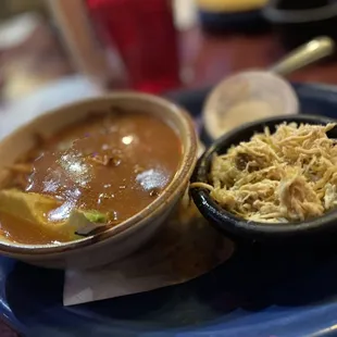 a bowl of soup and a bowl of rice