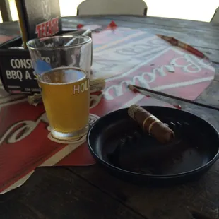 Out on the patio, with a beer and a fine NUB cigar.