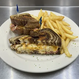 Corn beef or hand carved Turkey , sauerkraut, Swiss cheese and thousand island dressing .