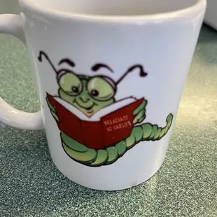 a cater reading a book