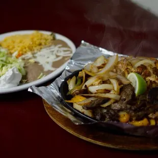 Steak Fajitas on a sizzling skillet!
