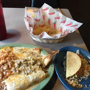 #1 combo.. taco, enchilada, tamale, Chile Riano, rice and beans ... enough for two...$12