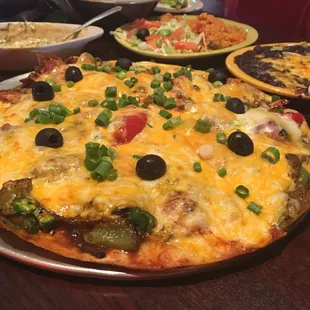 Mexican pizza with chicken fajitas, gauc, spinach dip MMMMMMMM!