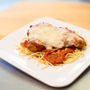 a plate of spaghetti and meat