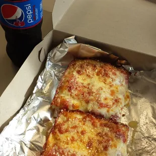 Lunch special $4.95 for a pop and 2 slices of pizza. It was very good...make sure you ask for garlic butter on the pizza!