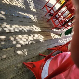 Outside, mix of sun and shade, watch out for the birds