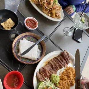 Carne asada plate and nachos with chicken