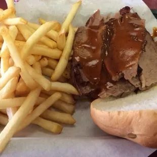 Sliced brisket and fries