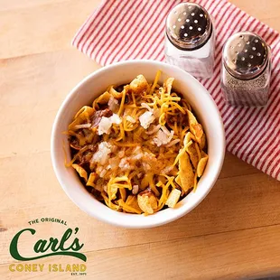 Frito Chili Pie : Fritos topped with Carl's Famous Chili, Shredded Cheddar Cheese and Carl's Onions