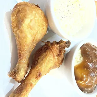Broasted chicken legs with cole slaw, mashed potatoes and gravy