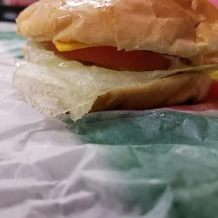 New California Burger, way off from the picture, filling for the time and wow, is that a different sized Patty too; what's really going on