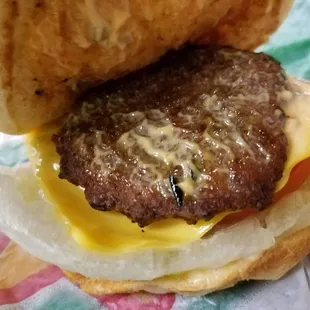 New California Burger, way off from the picture, filling for the time and wow, is that a different sized Patty too; what's really going on