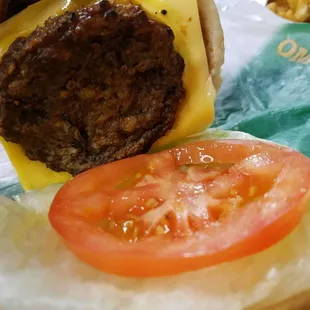 New California Burger, way off from the picture, filling for the time and wow, is that a different sized Patty too; what's really going on
