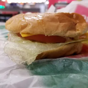 New California Burger, way off from the picture, filling for the time and wow, is that a different sized Patty too; what's really going on