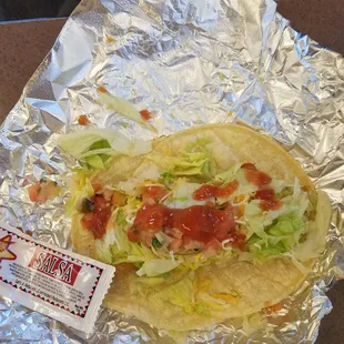 Fish taco, pretty good even if it doesn't look pretty