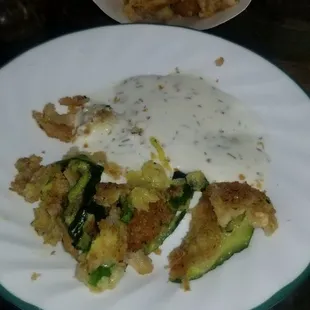 The fried zucchini that you're given but separated bcuz the breading falls off leaving you with the rind YUCK!