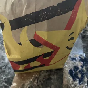 a paper bag on a counter