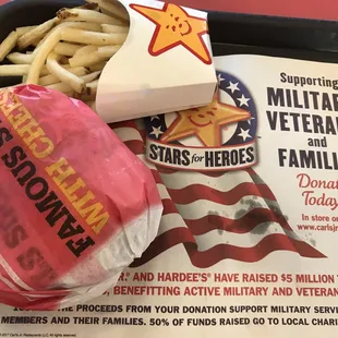 a tray of food including a hamburger and fries
