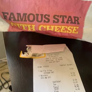 a receipt and a bag of famous star cheese